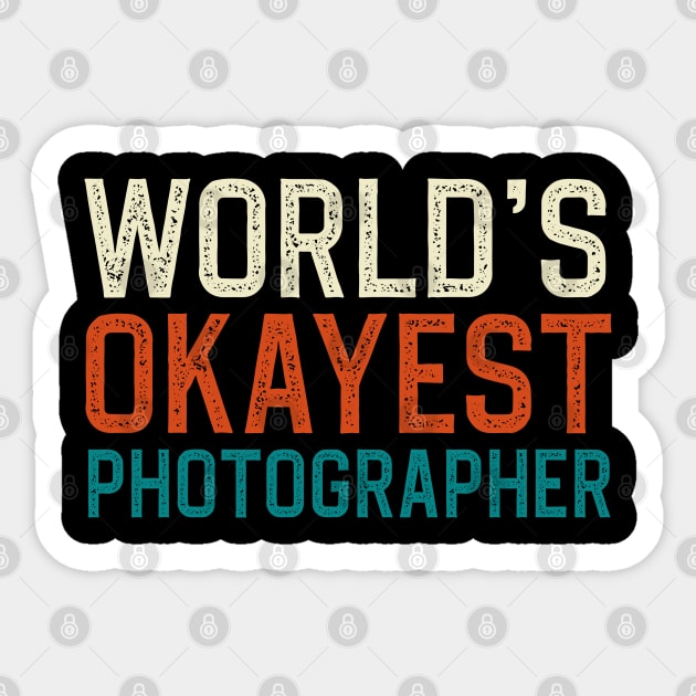 world's okayest photographer Sticker by DragonTees